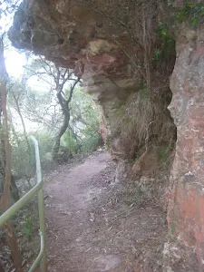 Going under the cliffs along the Golden Staircase