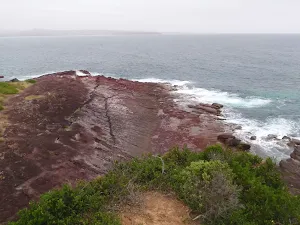 Rocks below Haycock headland
