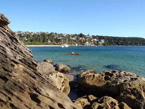 Kayaker passing the coast track
