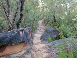 Track passing between boulders