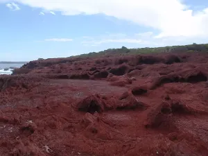 Erosion holes in red cliffs