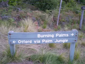 The sign at the southern end of Burning Palms Beach