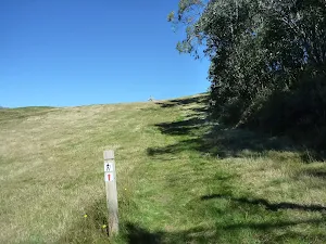 Walking up a ski run in summer