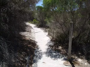White post marking the track
