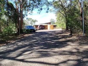 Walking down the road from the mud brick building
