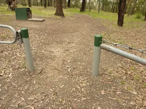 Green metal track markers near Mt Sugarloaf