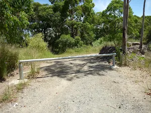 Locked metal gate on the coastal walk in the Wallarah Pennisula