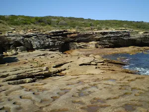 Rocky cliff near Long Bay