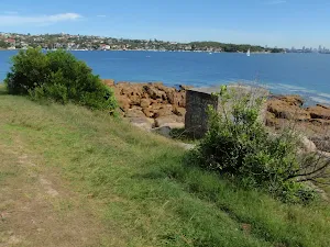 Walking past a brick bunker