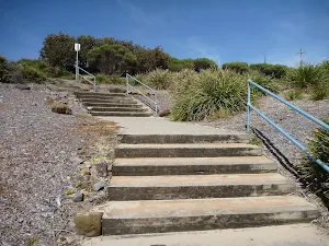 Steps up away from Caves Beach