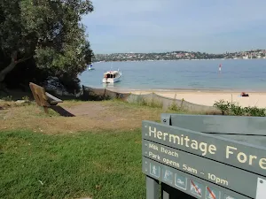 Sign behind Milk Beach