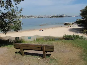 Seat looking over Milk Beach and Sydney Harbour