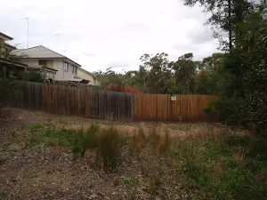 Fence line below Blaxland Library car park
