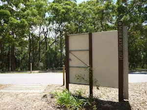 Large sign near Jetty Point Drive in Murray's Beach