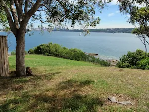 Walking across the grass around Greens (Laings) Point Park