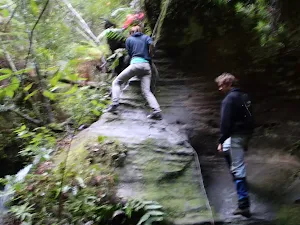 Climbing up one of the small waterfalls