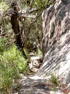 Rock outcrop on right of track