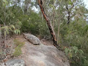 Attic Cave track crossing rock