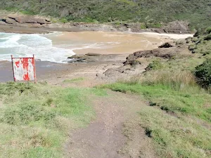 Looking across rocks to Snapper Point beach