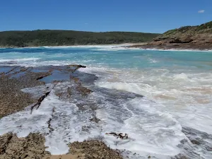 Water on rocks at Snapper Point beach