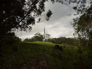 Red track leading to the Mt Sugarloaf car park 