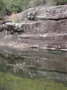 Mirror image in water next to Martins camping area