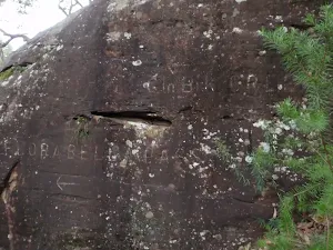 Directions scratched into rock