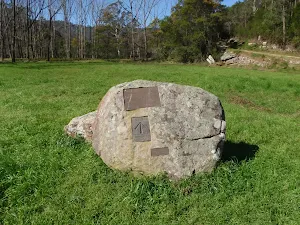 Clearing and plaque at the Int of Ten Mile Hollow Rd and Simpsons track