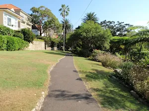 Path leading though the Cremorne Reserve with the house on the left