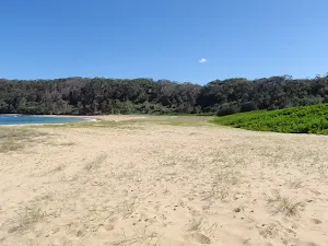 Looking along Bateau Bay beach