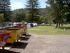 The Basin Campground Dumpsters. White posts to wharf